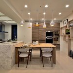 以米白色系為主調(diào)，稍加點(diǎn)綴的大理石紋、木色的溫潤雅致，猶如女主人般溫柔賢淑，入得了廚房也能出得了廳堂。